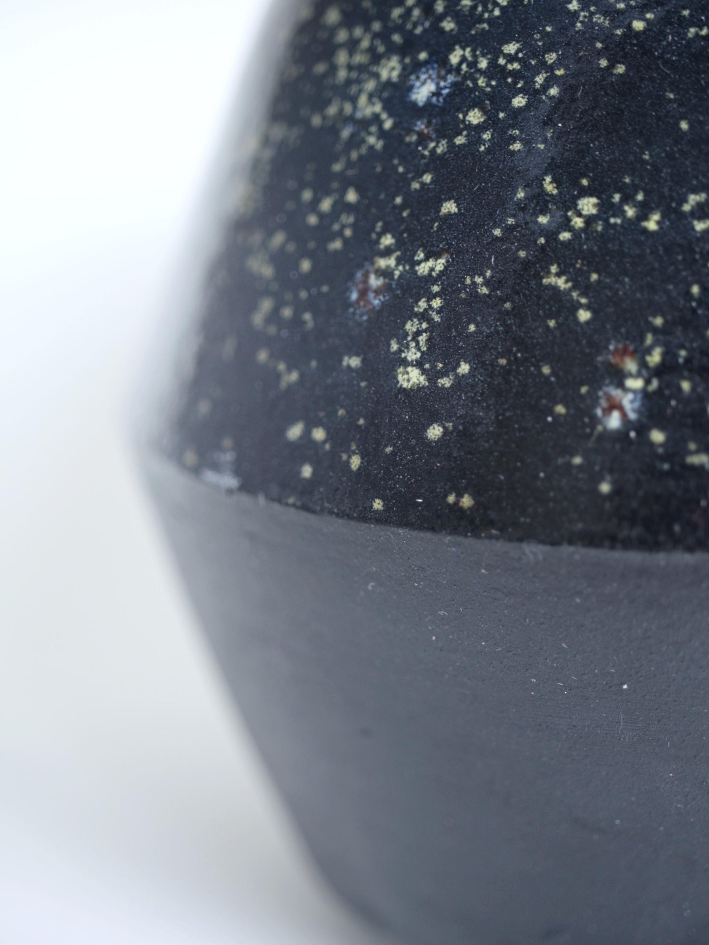 Small black vase