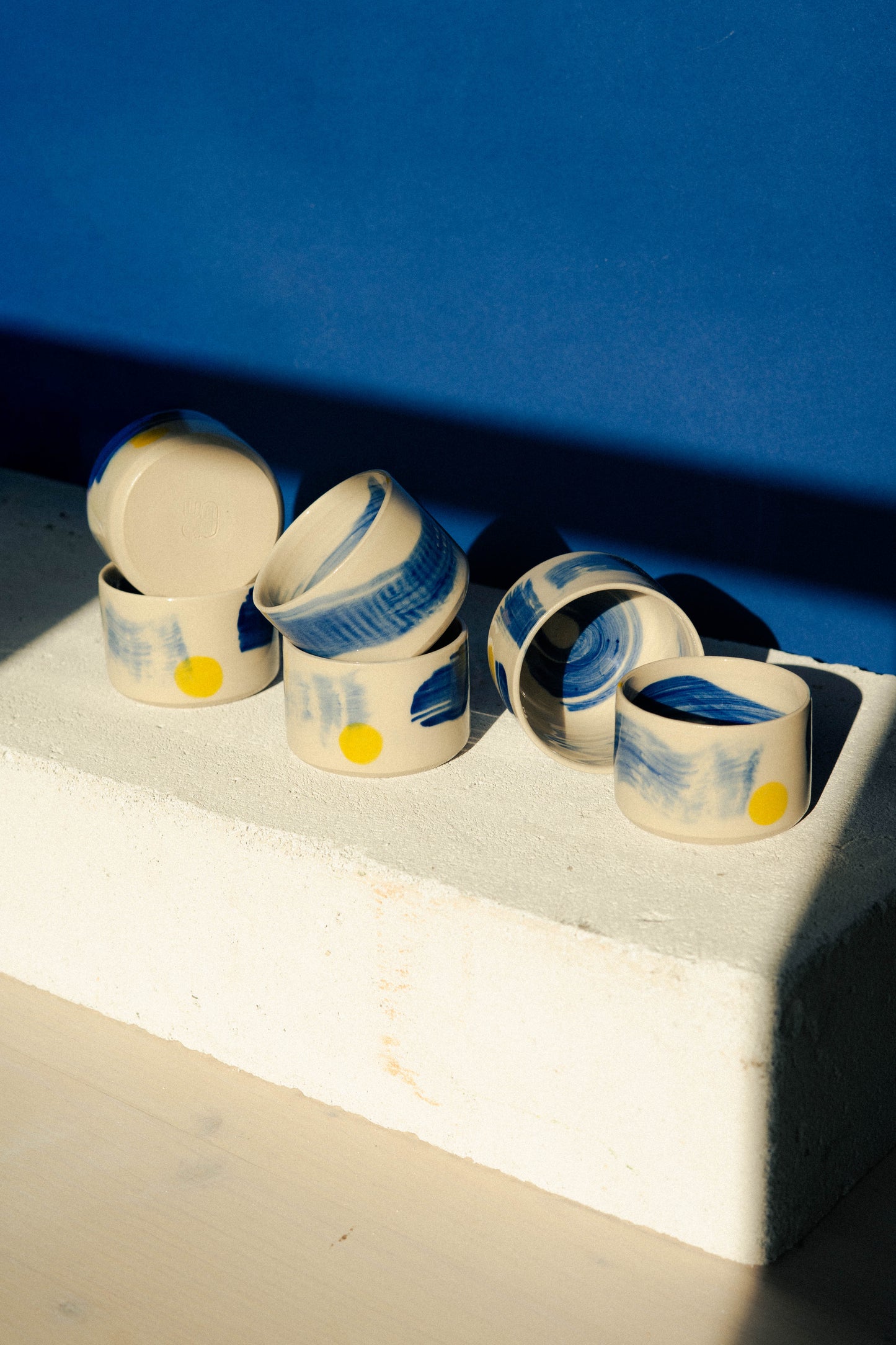 Small blue painted cup