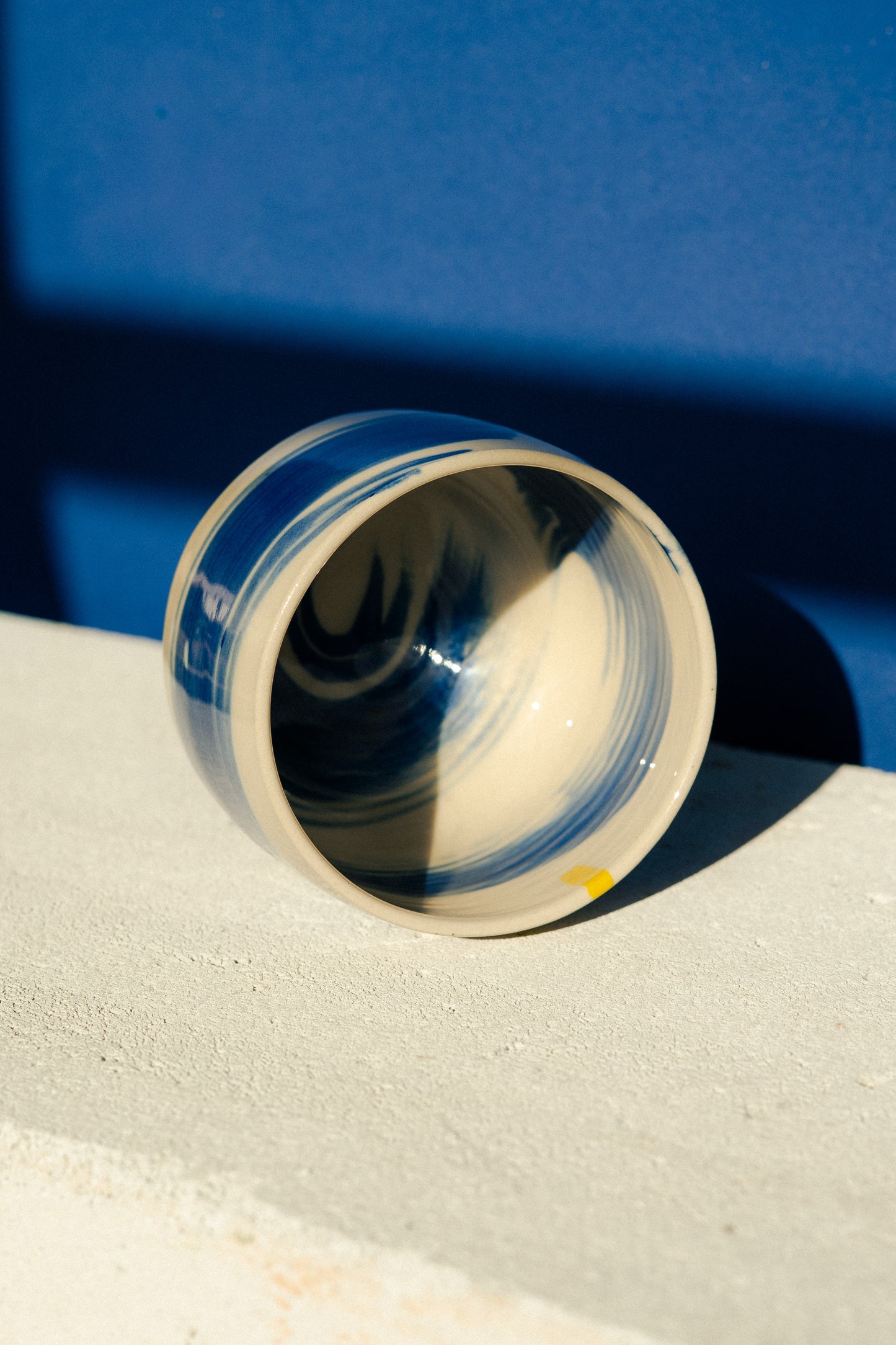 Small blue painted cup