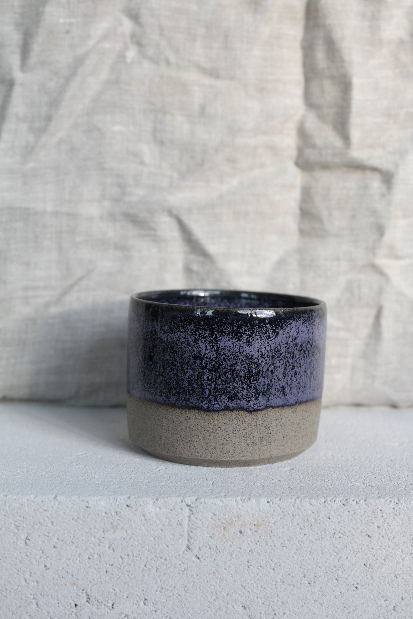 Medium purple/black cup
