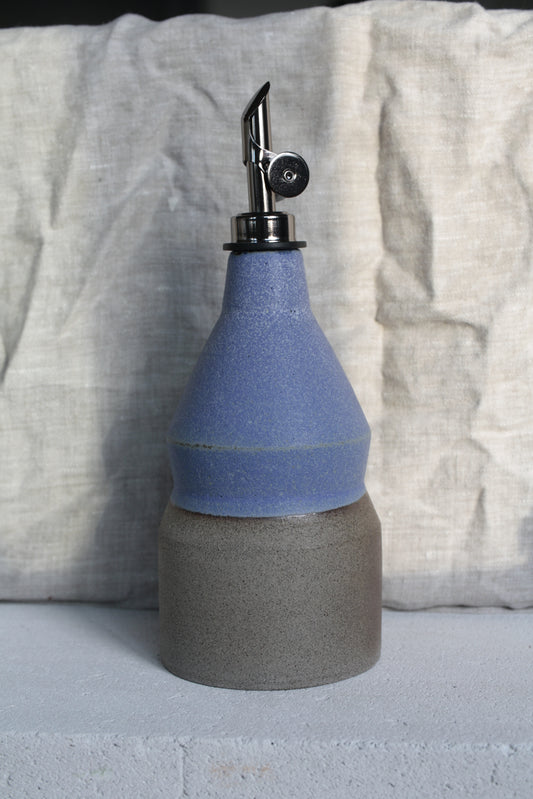 Ceramic oil bottle in blue