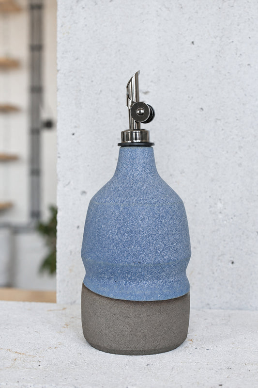 Ceramic oil bottle in blue