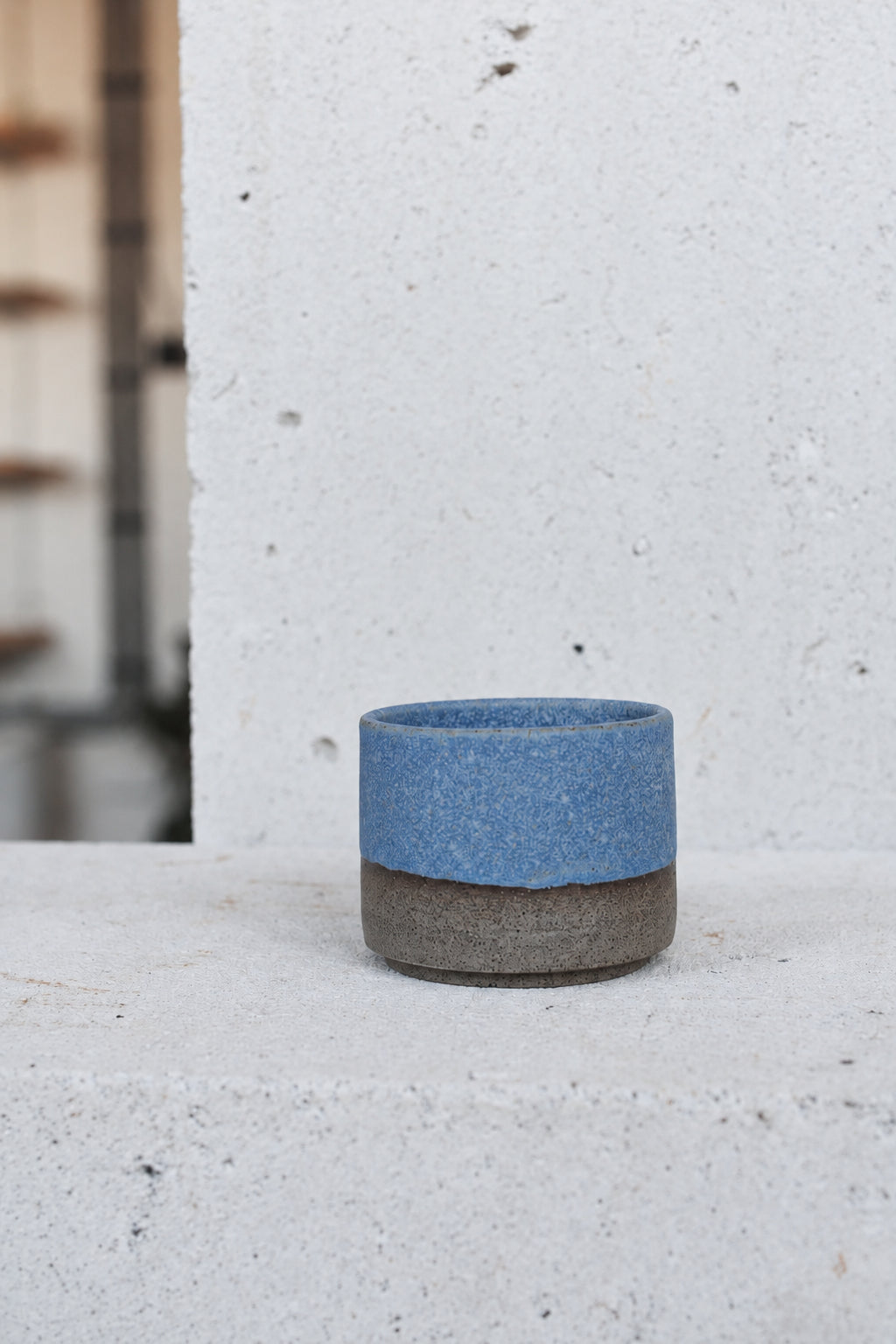 Small blue cup