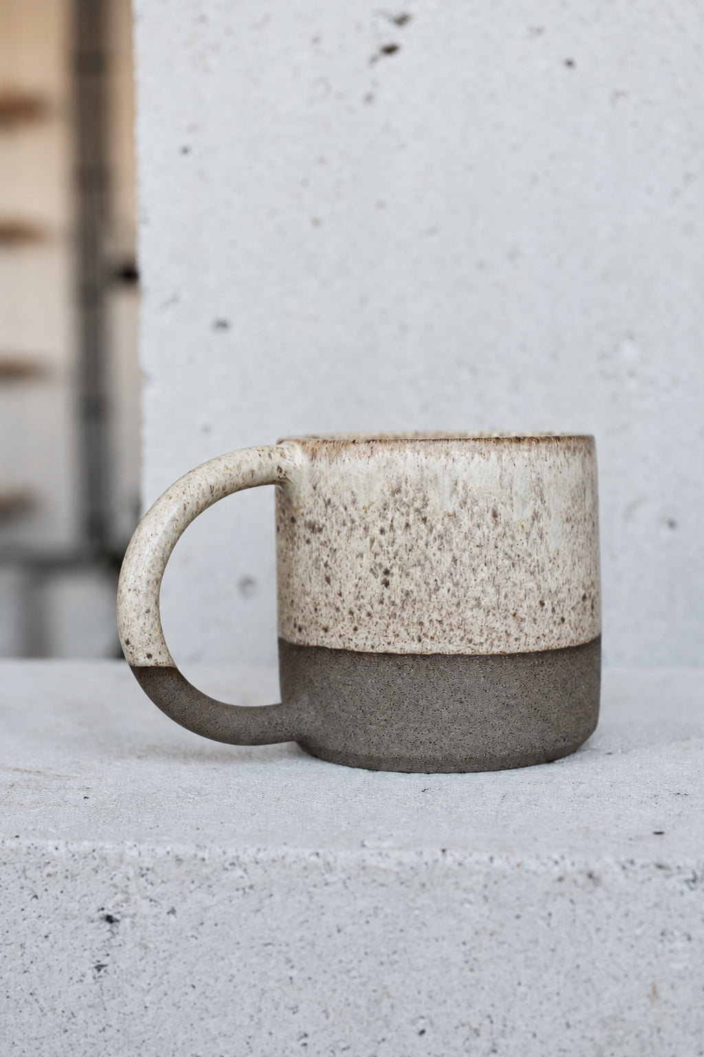 Large brown mug with sand glaze